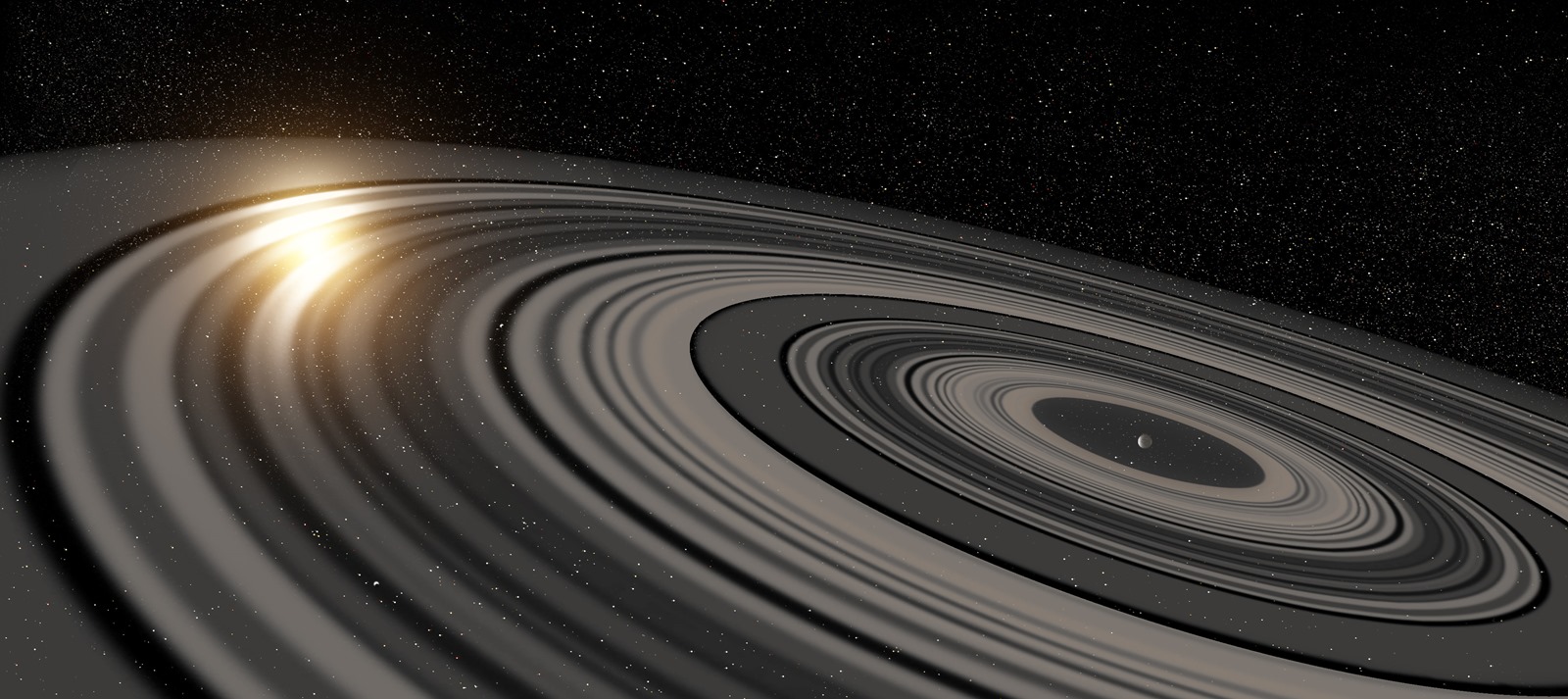 Des ombres amènent à modéliser un système d’anneaux largement plus grand que celui de Saturne